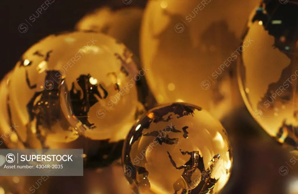 Six World Globes ( Focus on globe in forefront)