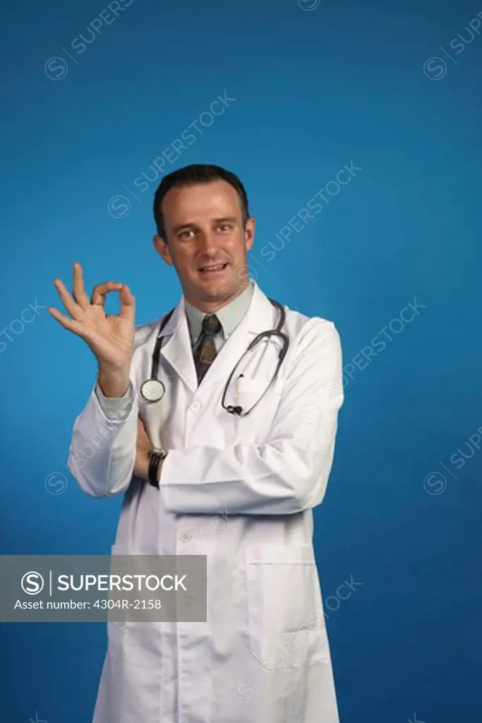 An Optimistic doctor looking at camera while smiling.