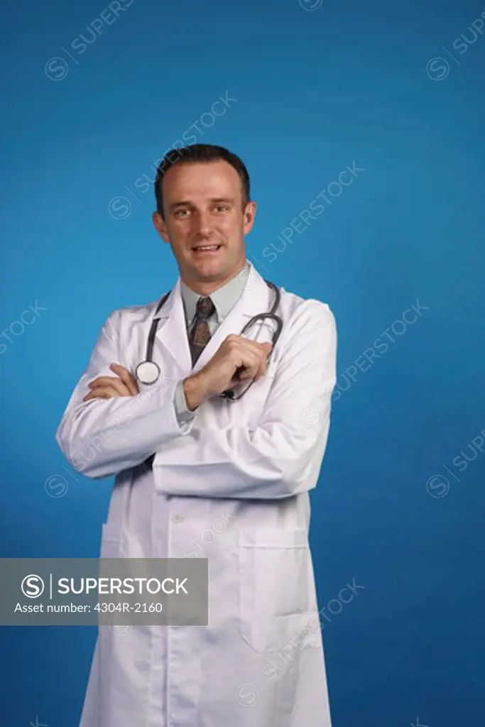 An Optimistic doctor looking at camera while smiling.
