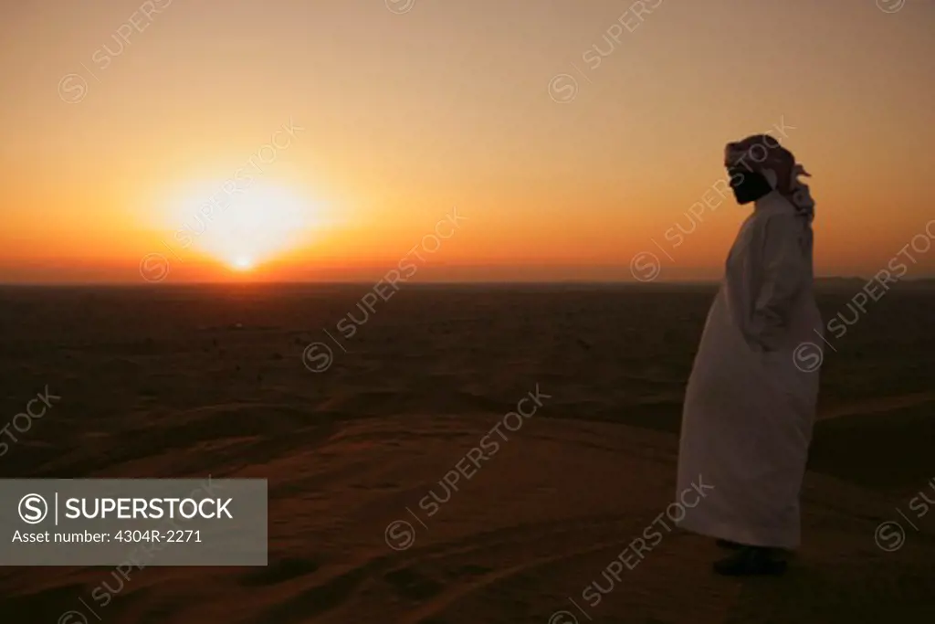 Arab Man watching the sunset