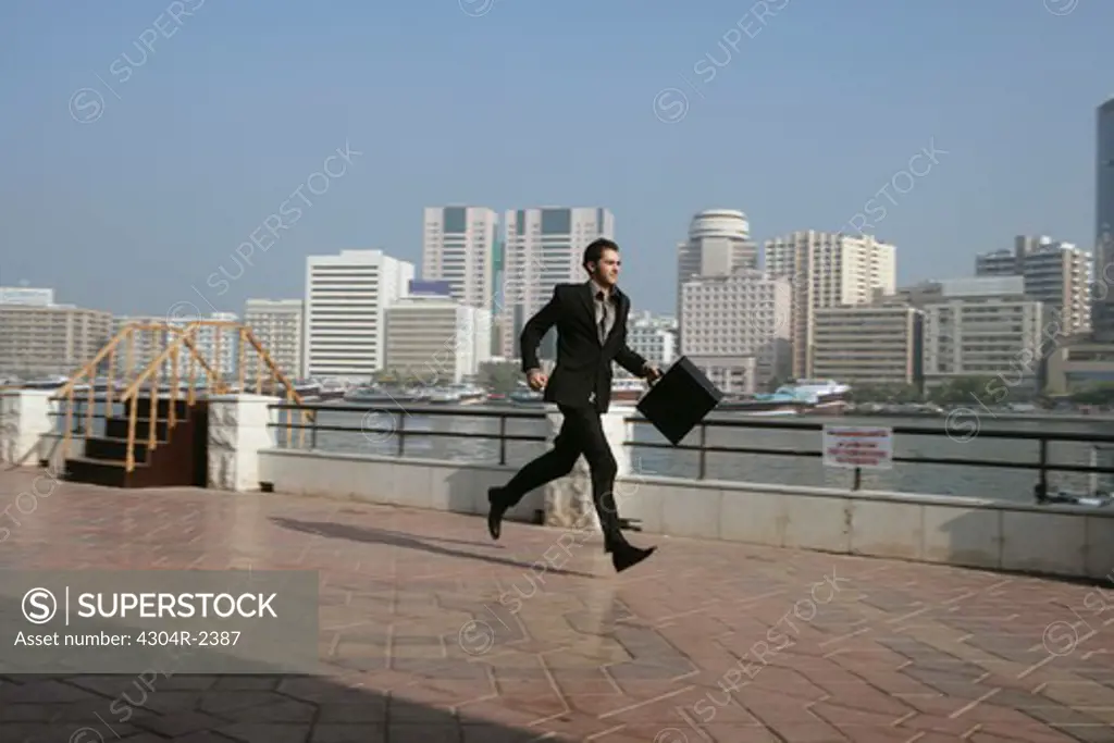 Young Businessman running