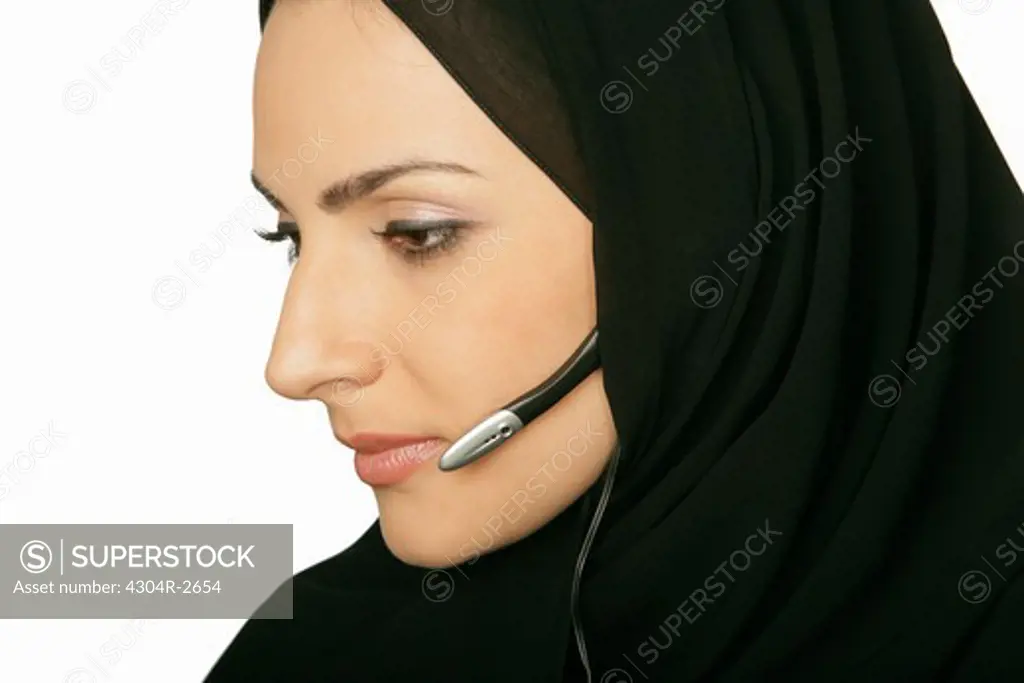 Arab lady with a headset.