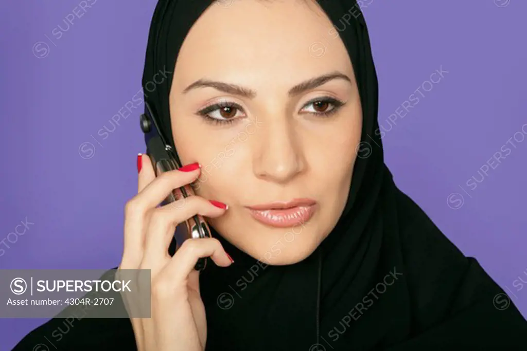 Arab lady on the phone.