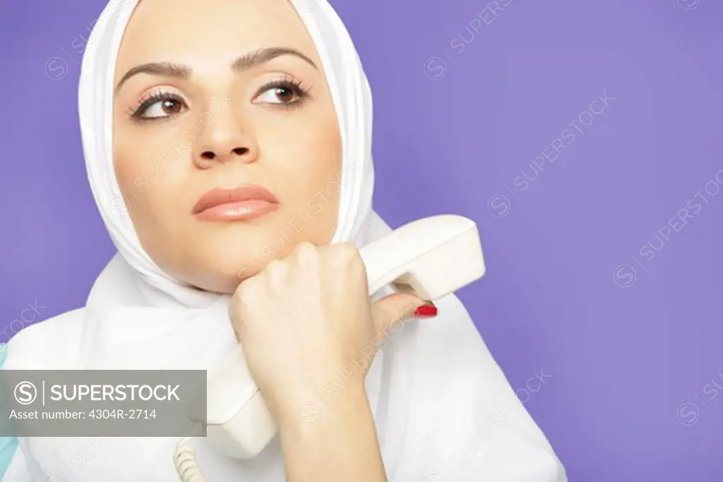 Arab lady on the phone.