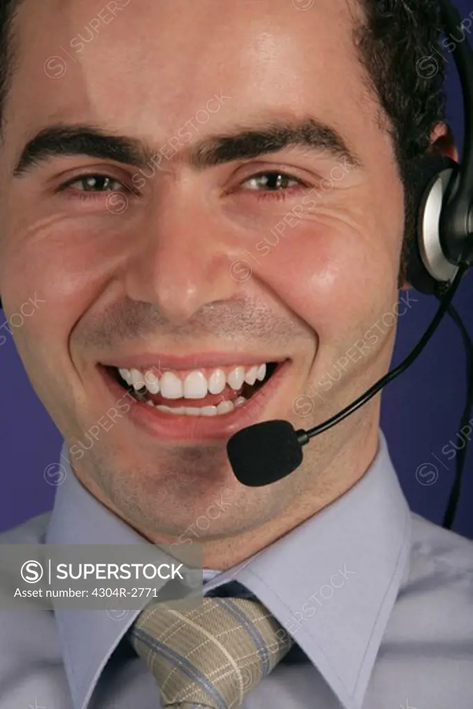 Businessman with headset.