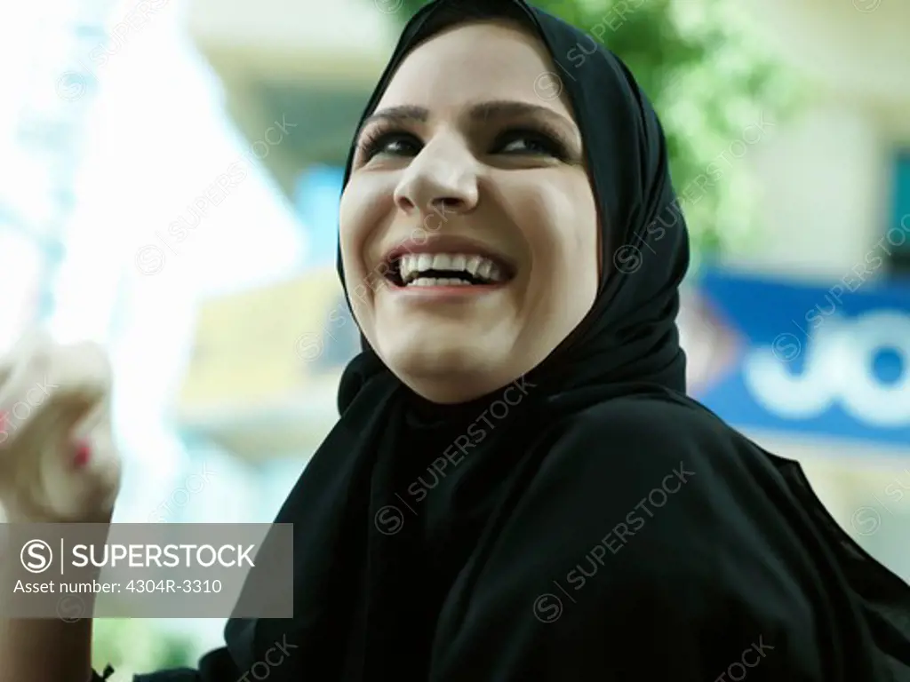 Arab lady with full of joy