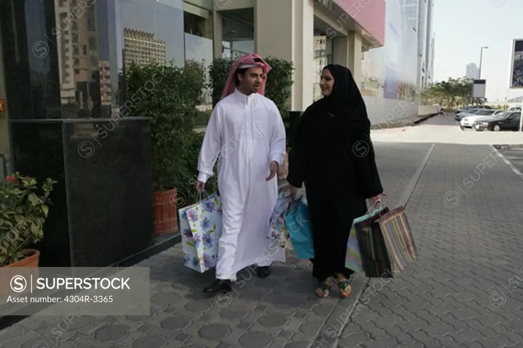 Arab Couple with a shopping bag