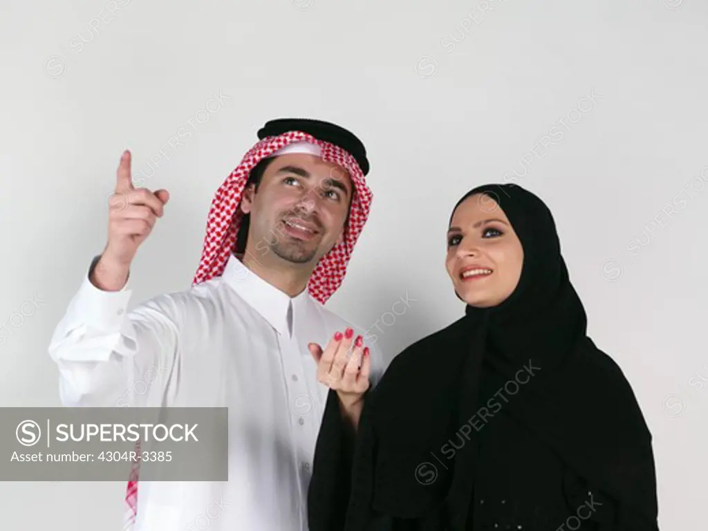 Arab Couple looking away
