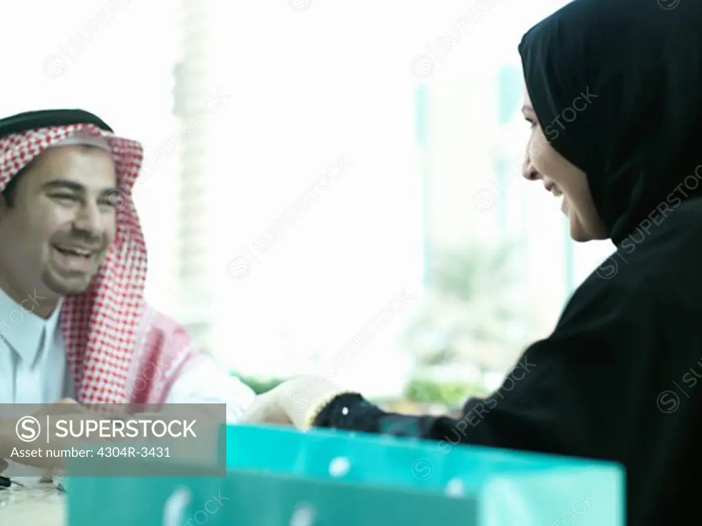 Arab couple on a coffee break