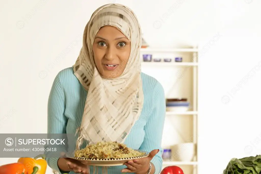 Arab Lady serving Biryani rice