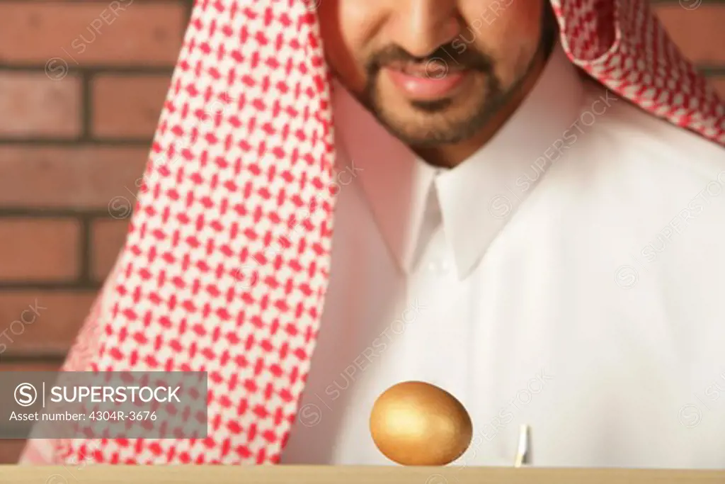Arab Man with a golden egg