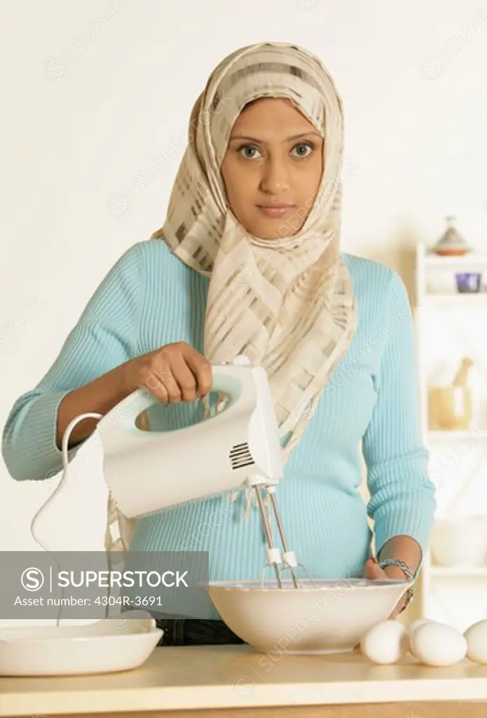 Arab Lady with egg beater