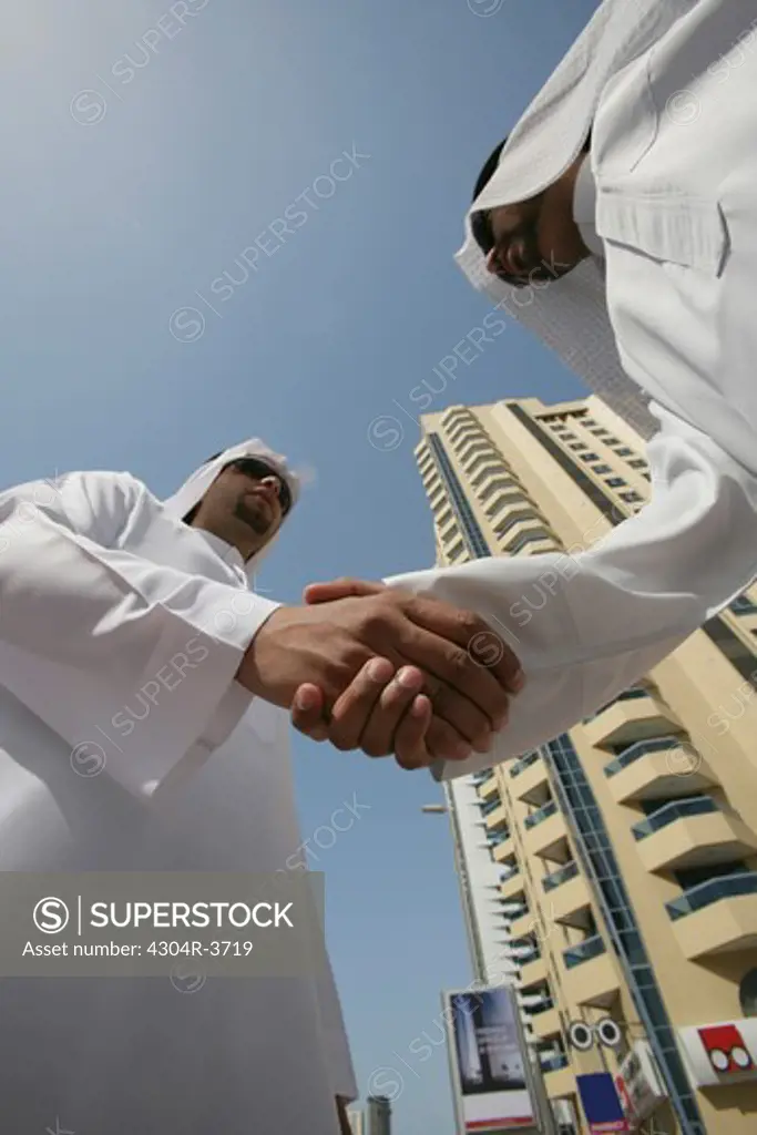 Arab Businessmen shaking hands