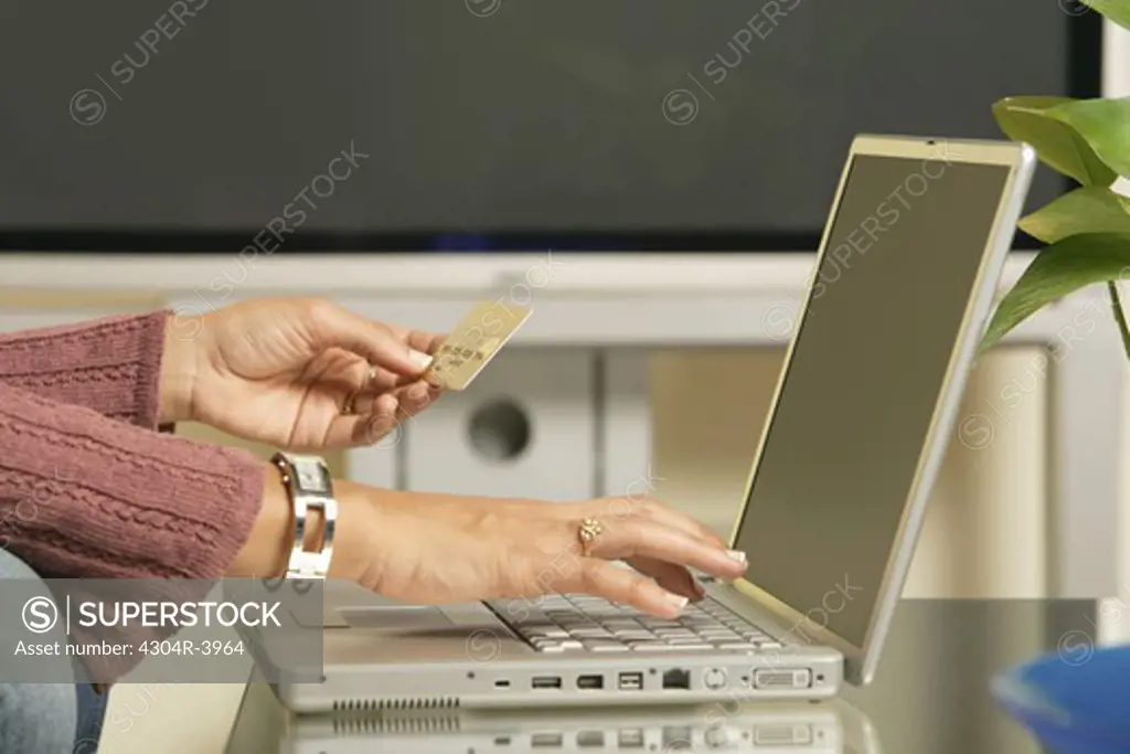 Lady busy in online transaction