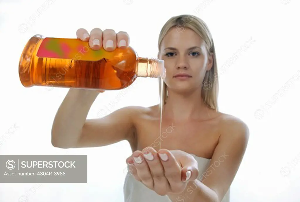 Woman with a liquid soap