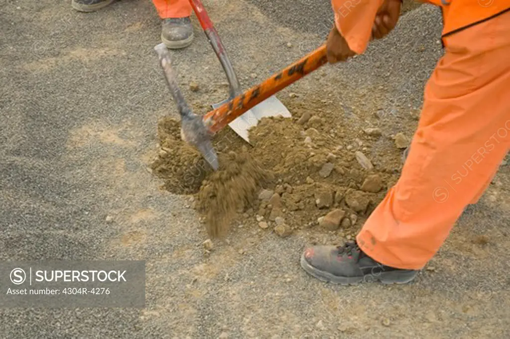 Man digging the ground