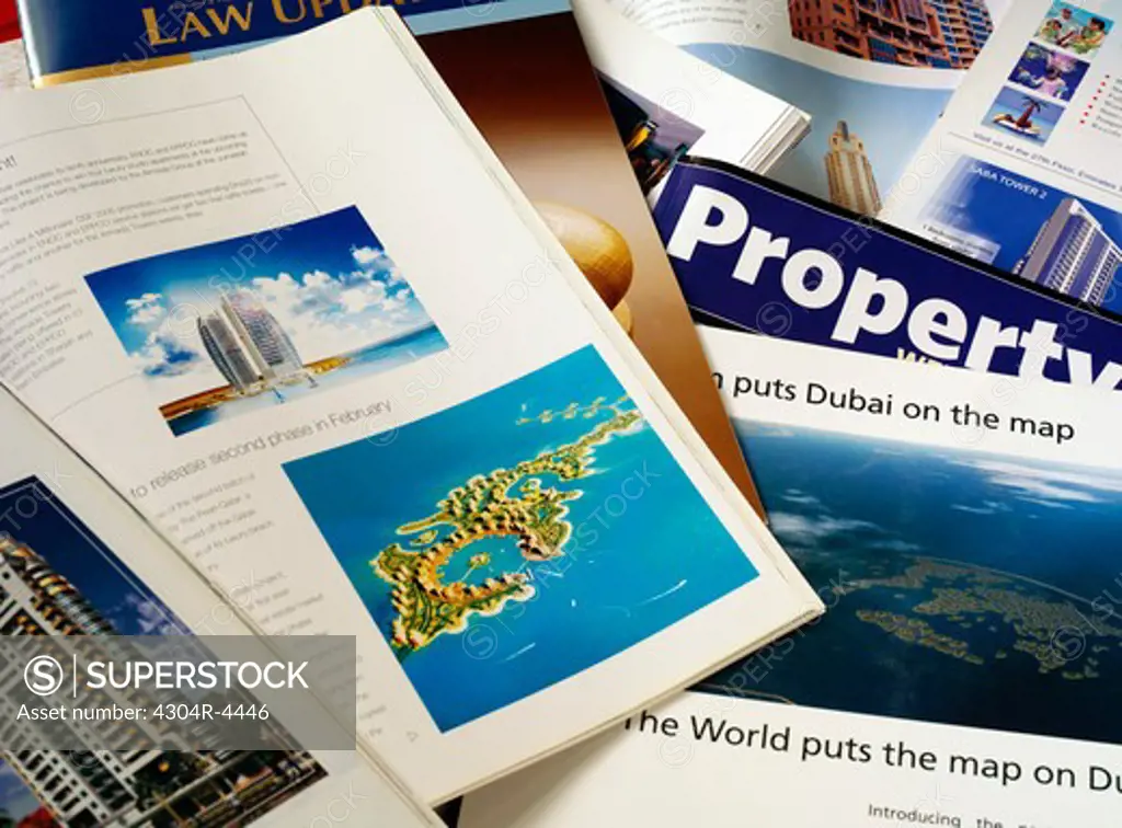 Print Media with new construction ads in Dubai
