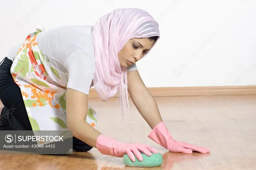 Lady Cleaning Floor