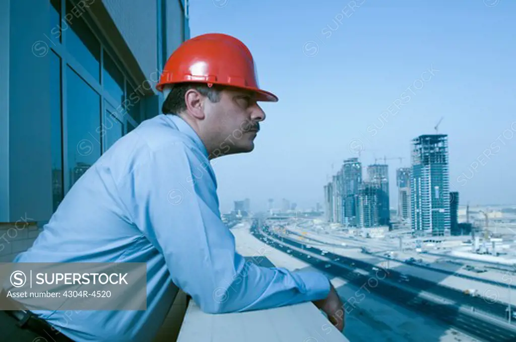 Engineer looks at the building constructions in Dubai