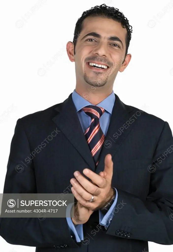 Businessman clapping