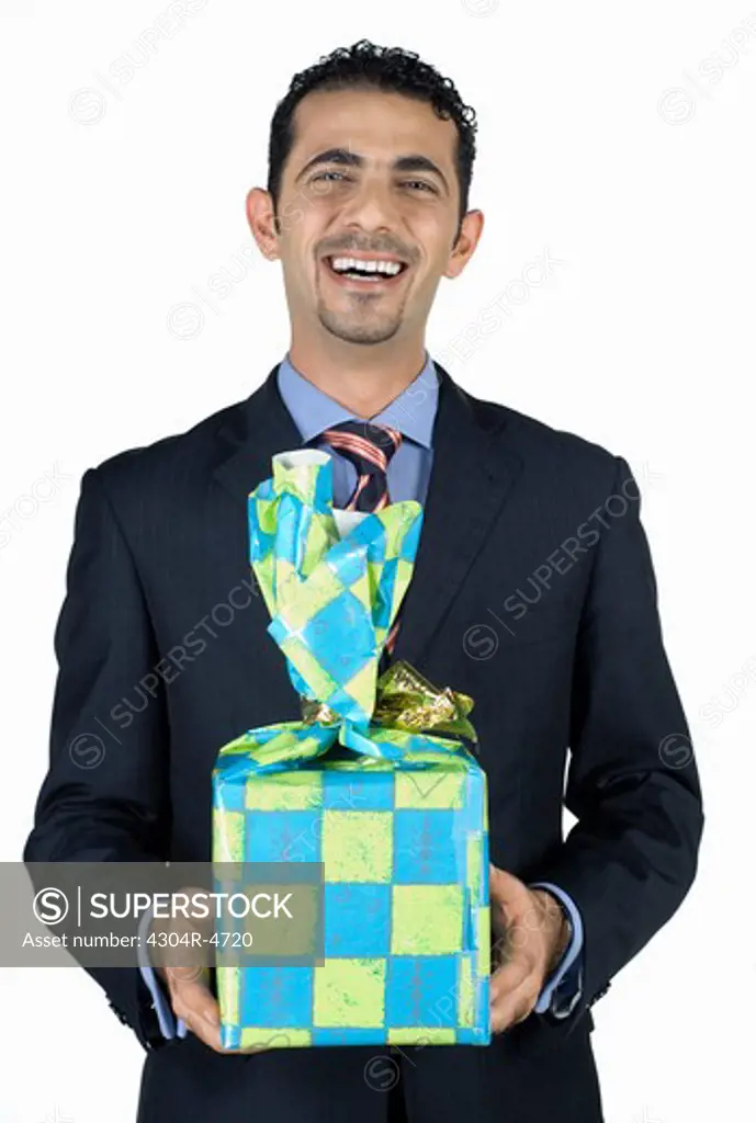 Businessman holding present