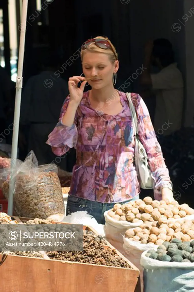 Young lady shopping in the spice market - Dubai