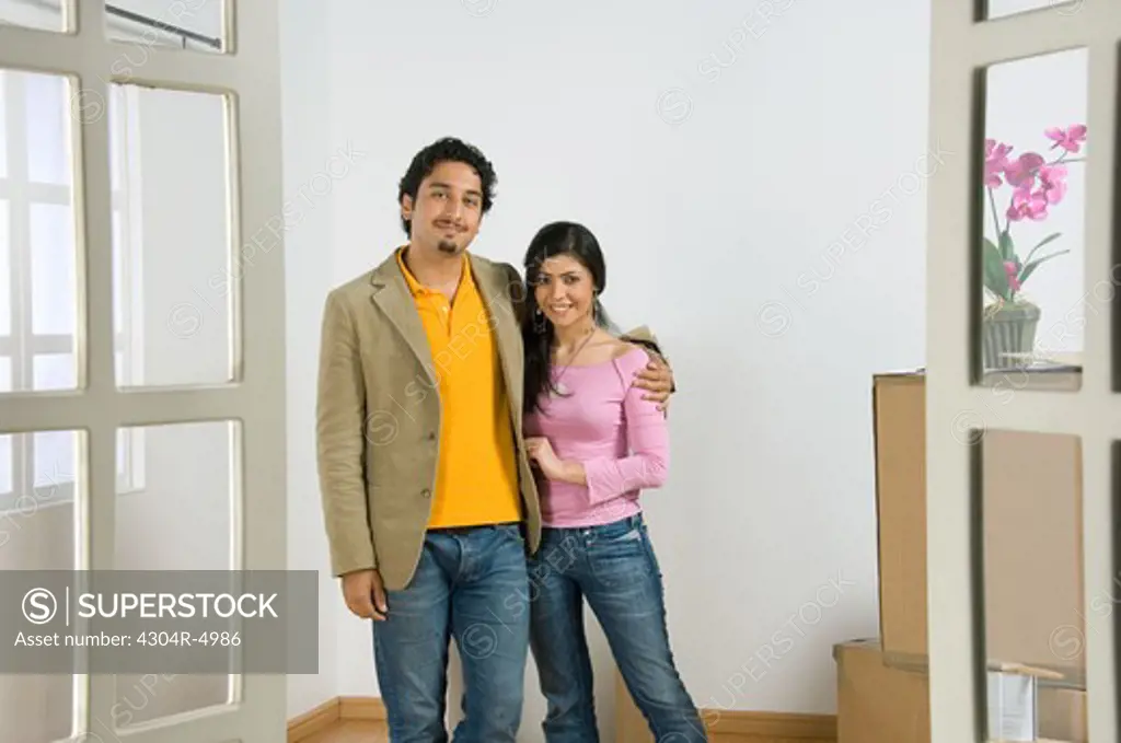 Young woman moving into a new home