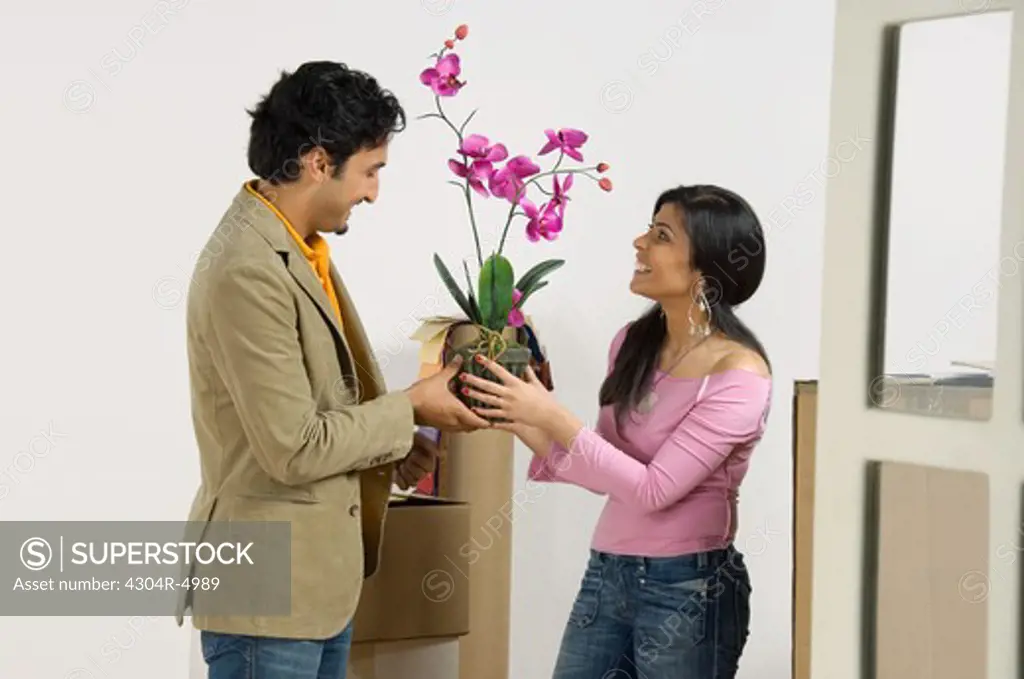 Young woman moving into a new home