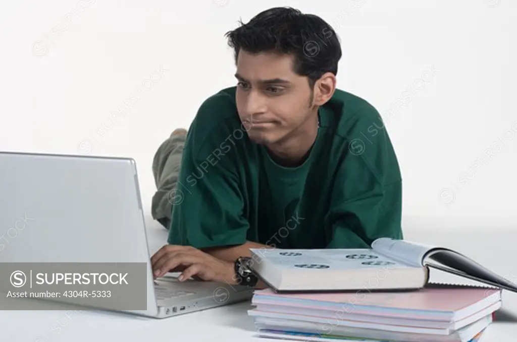 Young man using laptop