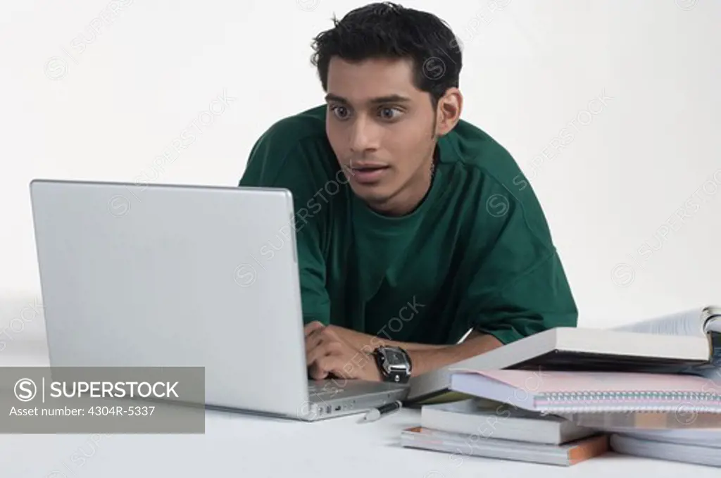Young man using laptop