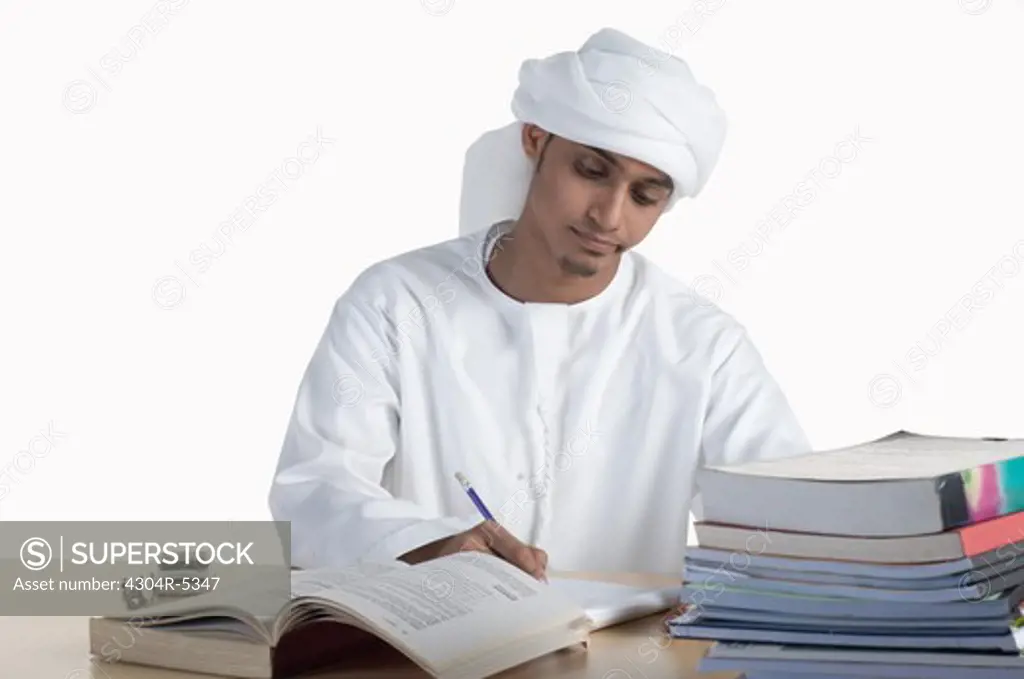 Young man writing