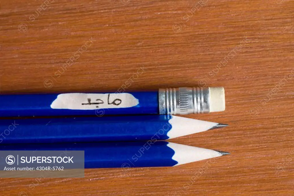 Pencil against brown background,elevated view