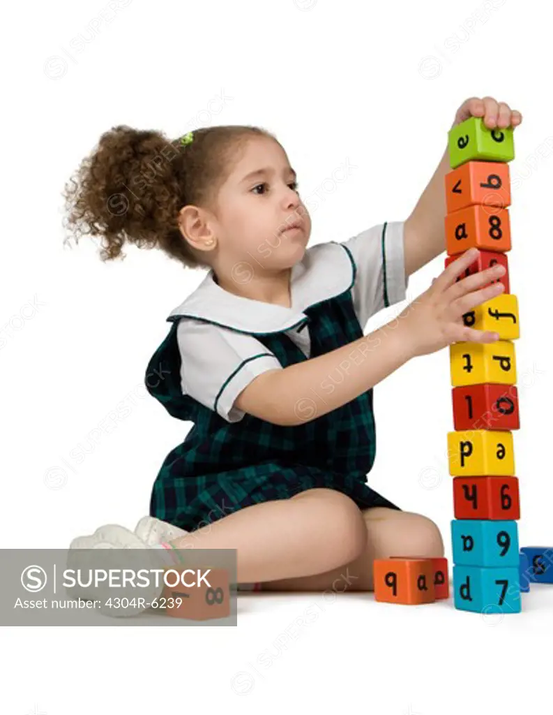 Girls playing with plastic blocks