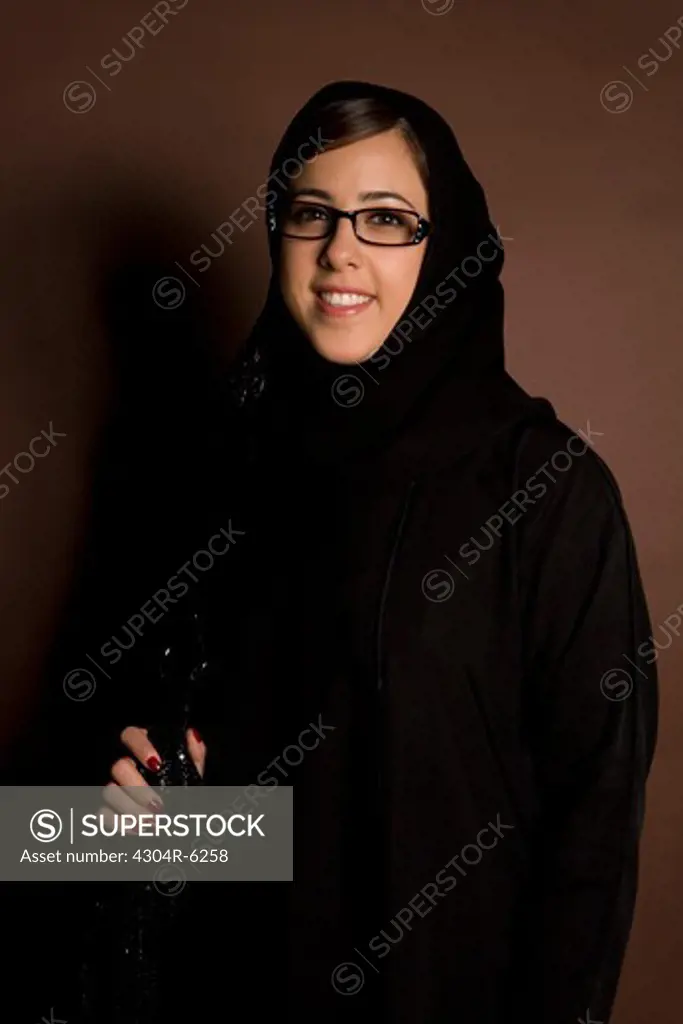 Young woman with glasses, portrait