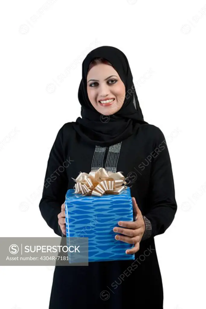Arab woman holding a gift