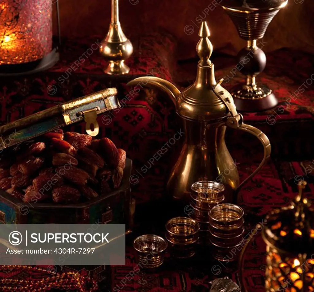 Dates and tea set with Ramadan ornaments