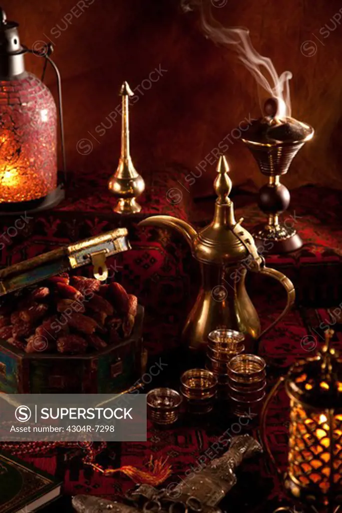 Dates and tea set with Ramadan ornaments