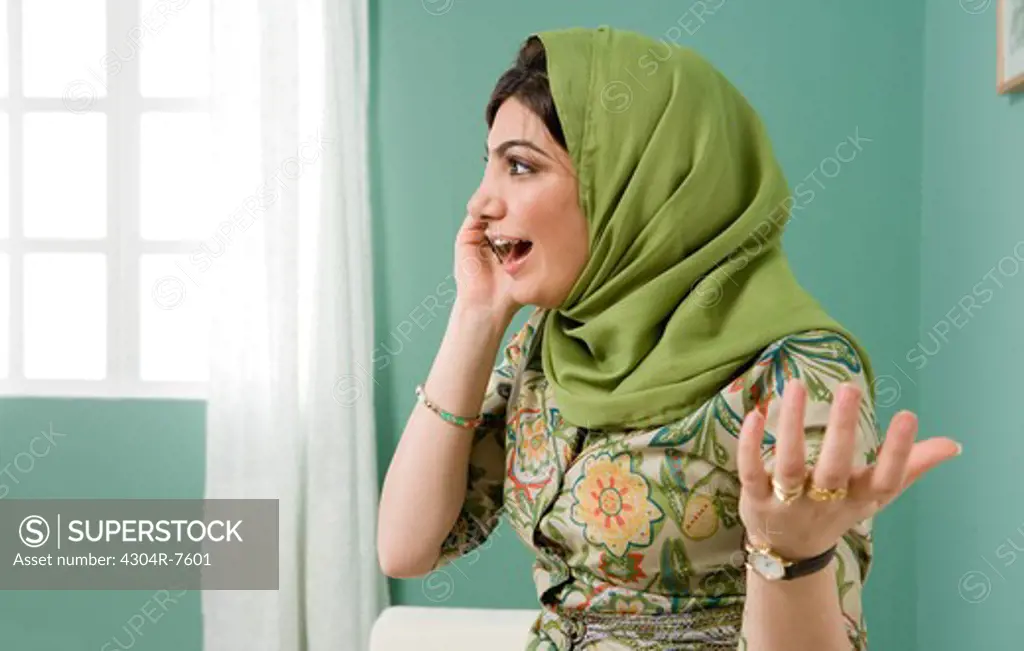 Arab woman using cellphone