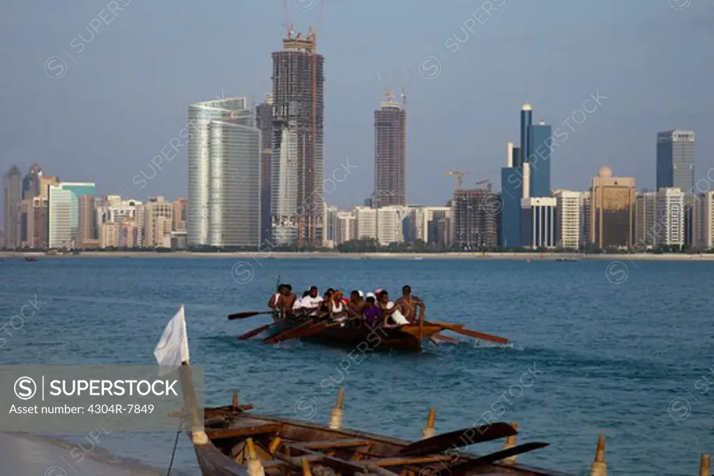 Traditional Rowing Dhow with Abu Dhabi sky in background, UAE