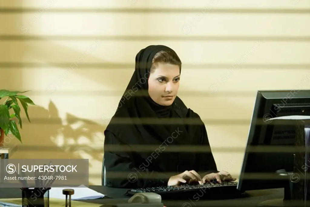 Arab businesswoman in office