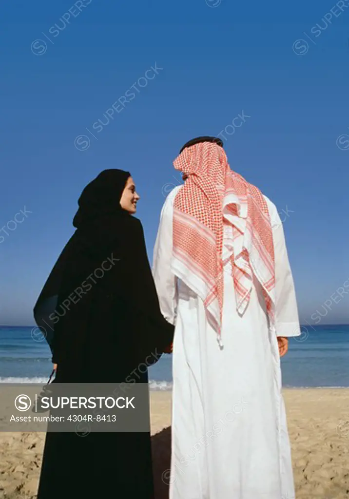 Arab couple on the beach