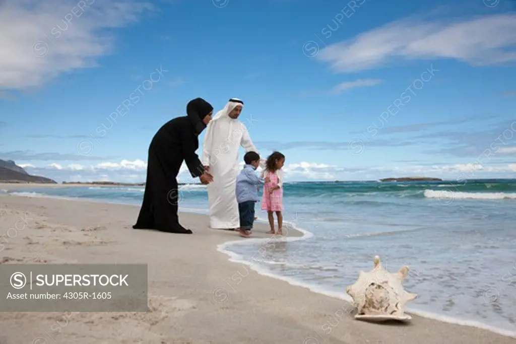 Arab family at the beach.