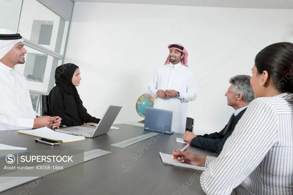 Group of business people having a meeting.