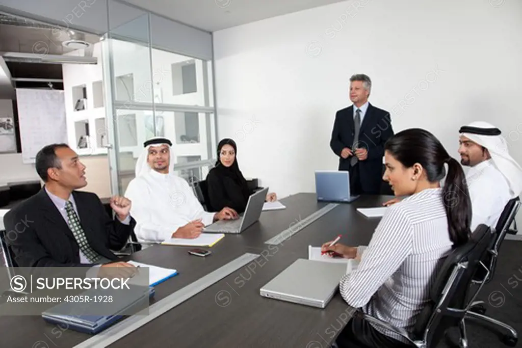 Group of business people having a meeting.