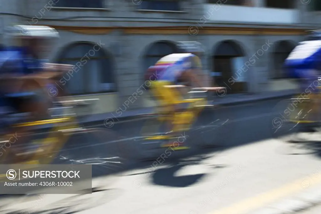 Cyclists on a street.