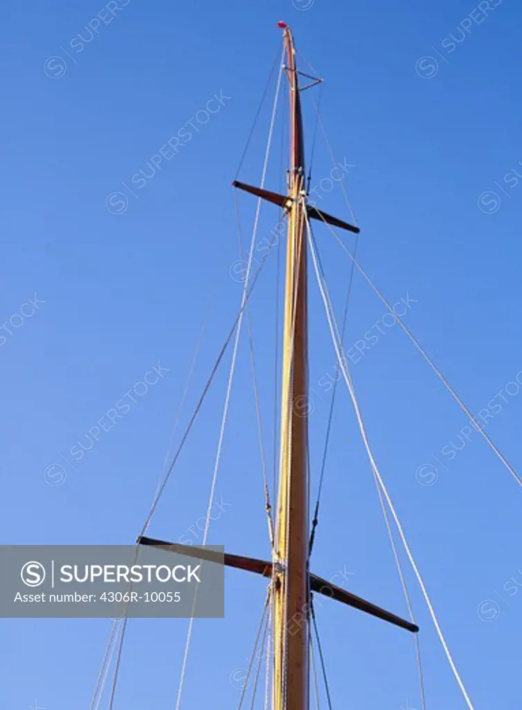 A mast on a sailing boat.