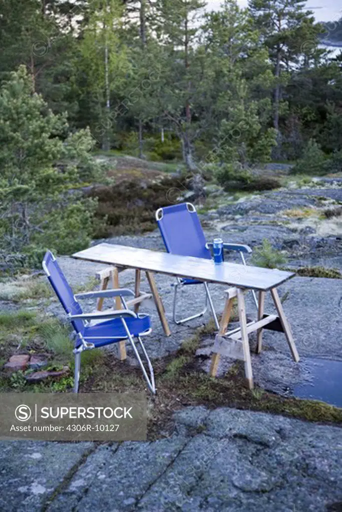 Chairs on a rock in the archipelago.