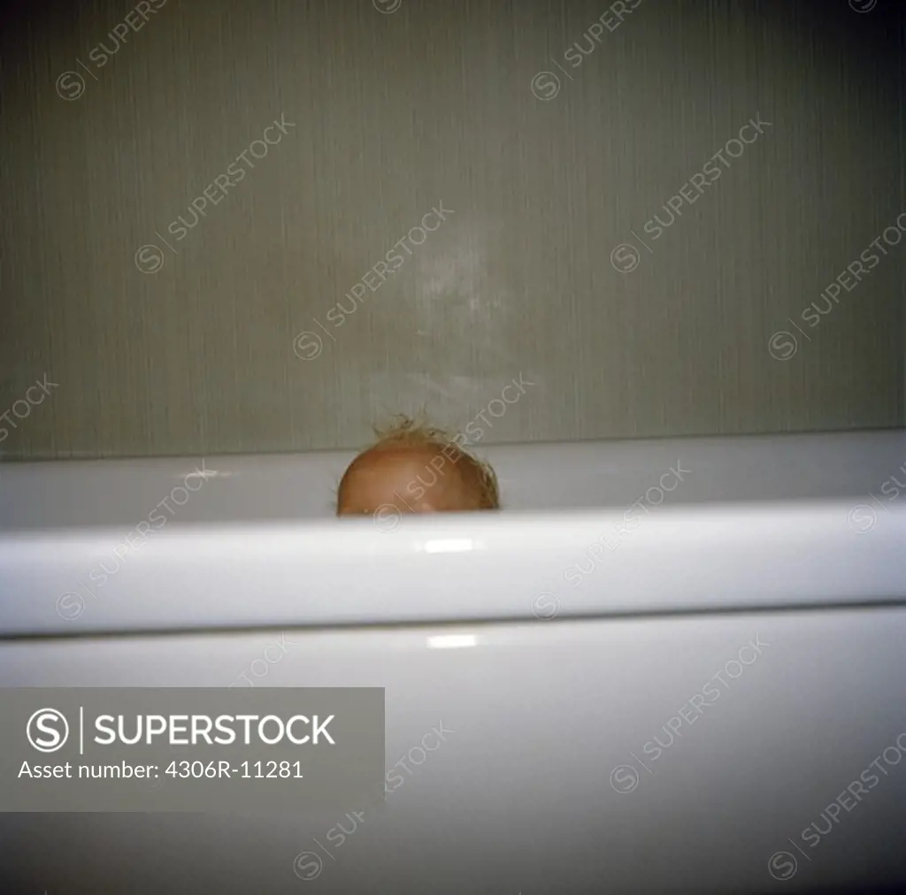 A little girl in a bath tub, Sweden.