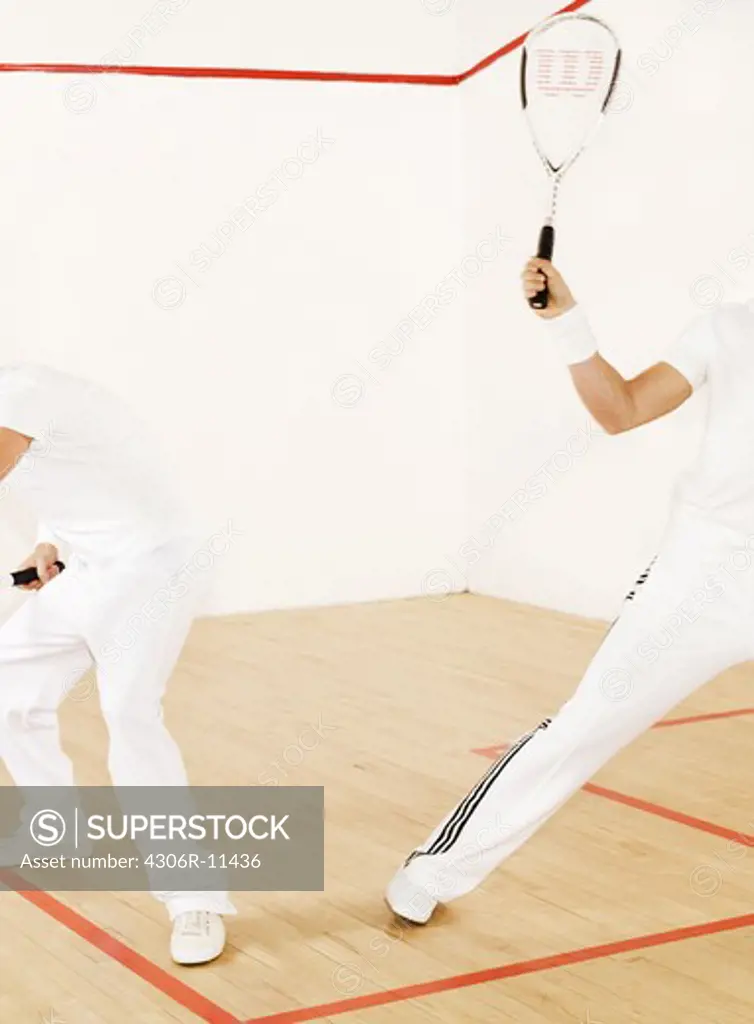 Two people playing squash, Stockholm, Sweden.