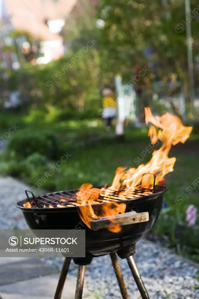 A grill on fire, Sweden.